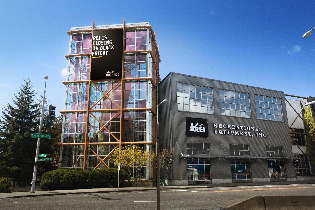 REI’s Seattle flagship store displaying a banner announcing its Black Friday closure.